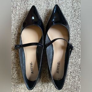 Black, pointed toe, Mary Jane flats.